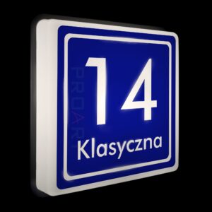 Podświetlany numer na dom 230V Popularny wzór K+ z czarną ramką maskującą.